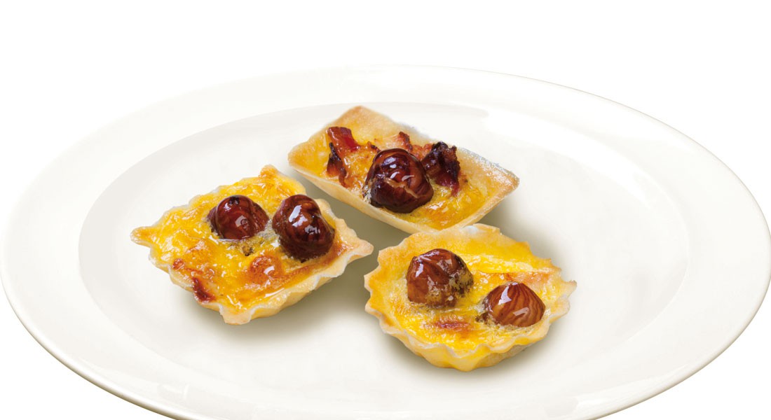 Tortine salate con porro, pancetta e Nocciole Ventura